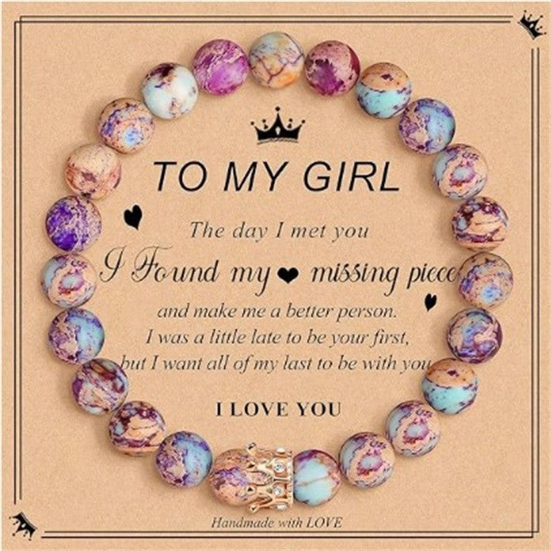 Unisex rhodochrosite beaded bracelet - side view showing zebra crystal patterns