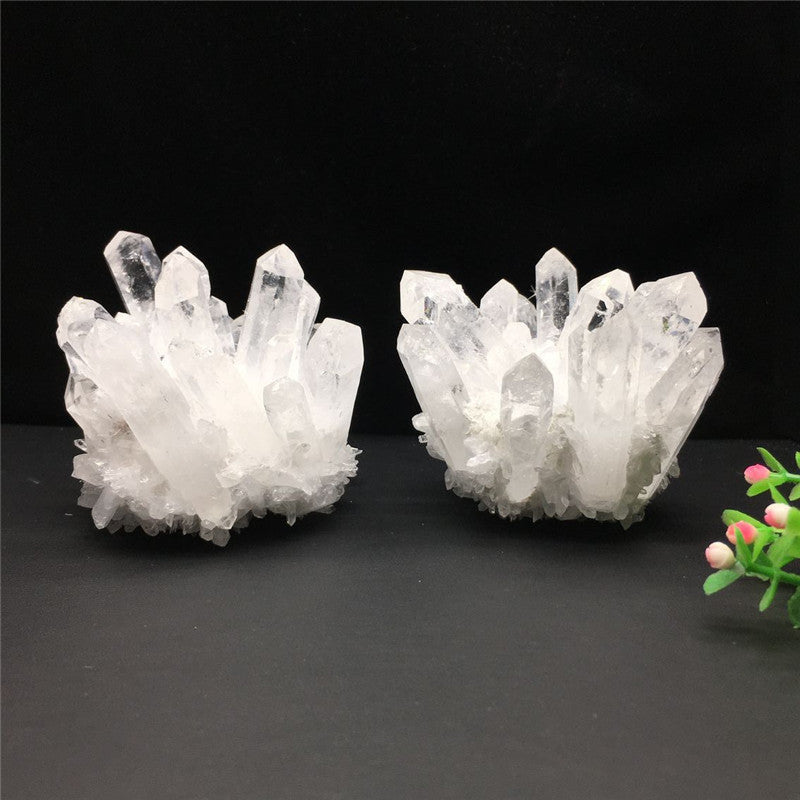 Raw white crystal cluster showing natural crystal points