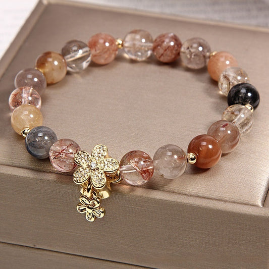 Golden rutilated quartz bracelet with natural golden needle inclusions