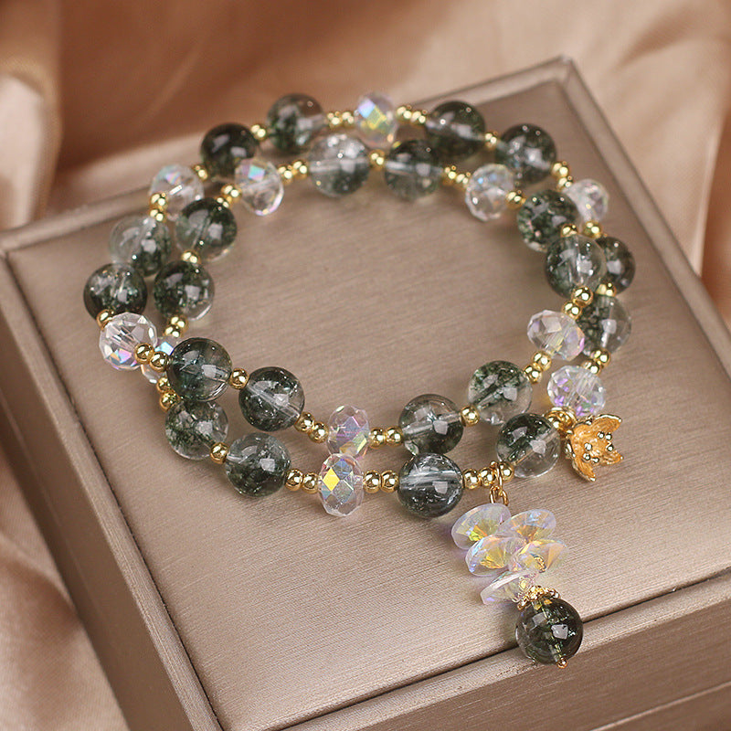 Green crystal botanical bracelet showing bead quality and polish